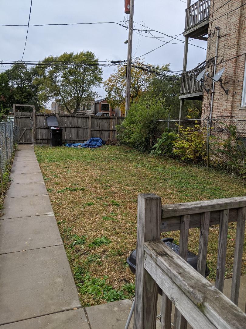 Undisclosed Address Chicago, IL 60623 - Photo 5 of 21 a view of a pathway and a yard