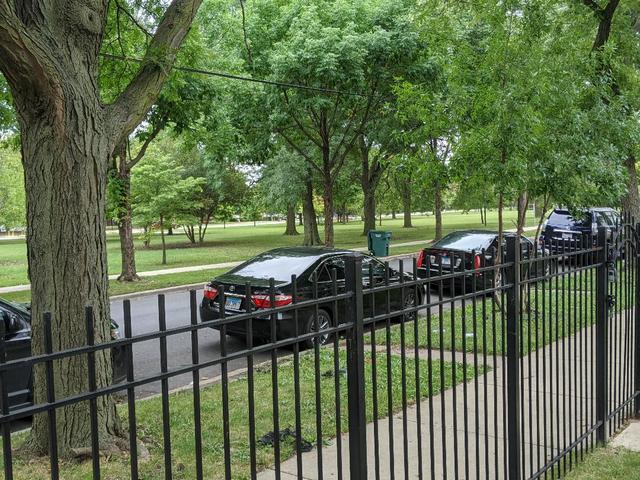 Undisclosed Address Chicago, IL 60623 - Photo 7 of 21 a view of a street from a balcony