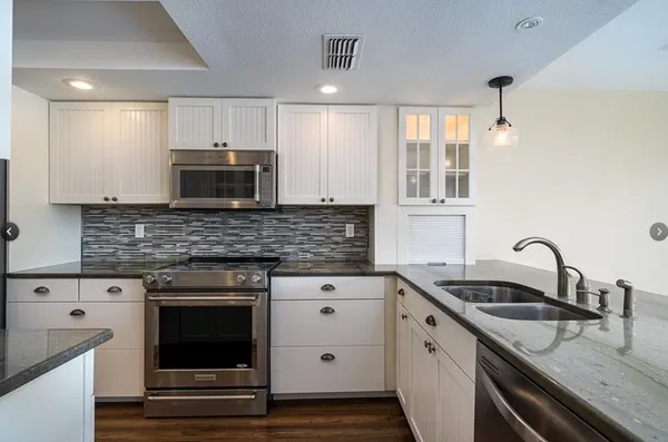 a view of a kitchen and kitchen