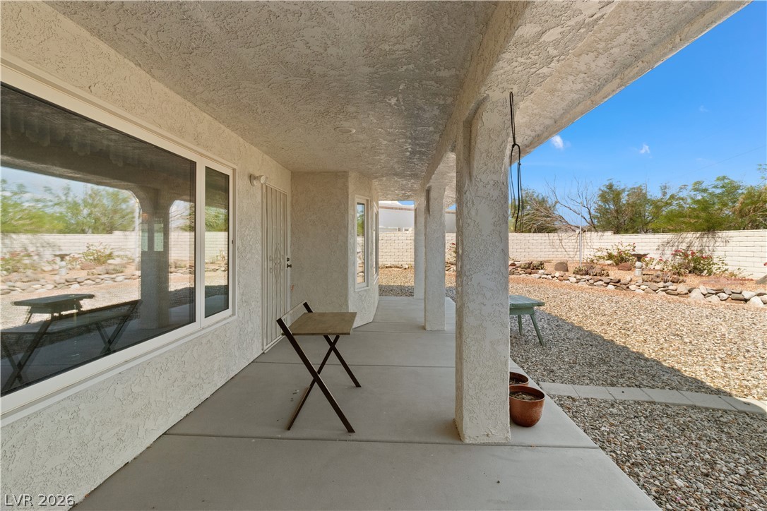 2055 Cholla Way Laughlin, NV 89029 - Photo 52 of 87 A deep covered patio offers shade and a vantage point over the low-maintenance desert landscape.