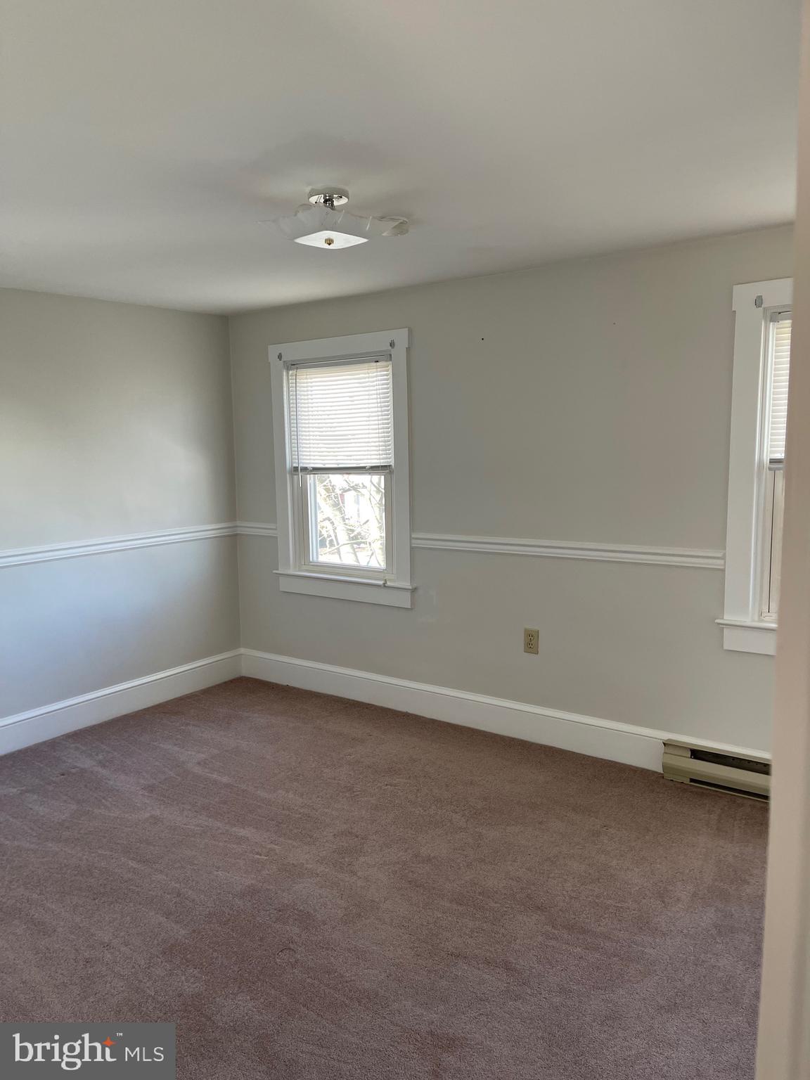 23 Addison Street Oxford, PA 19363 - Photo 12 of 15 an empty room with a window
