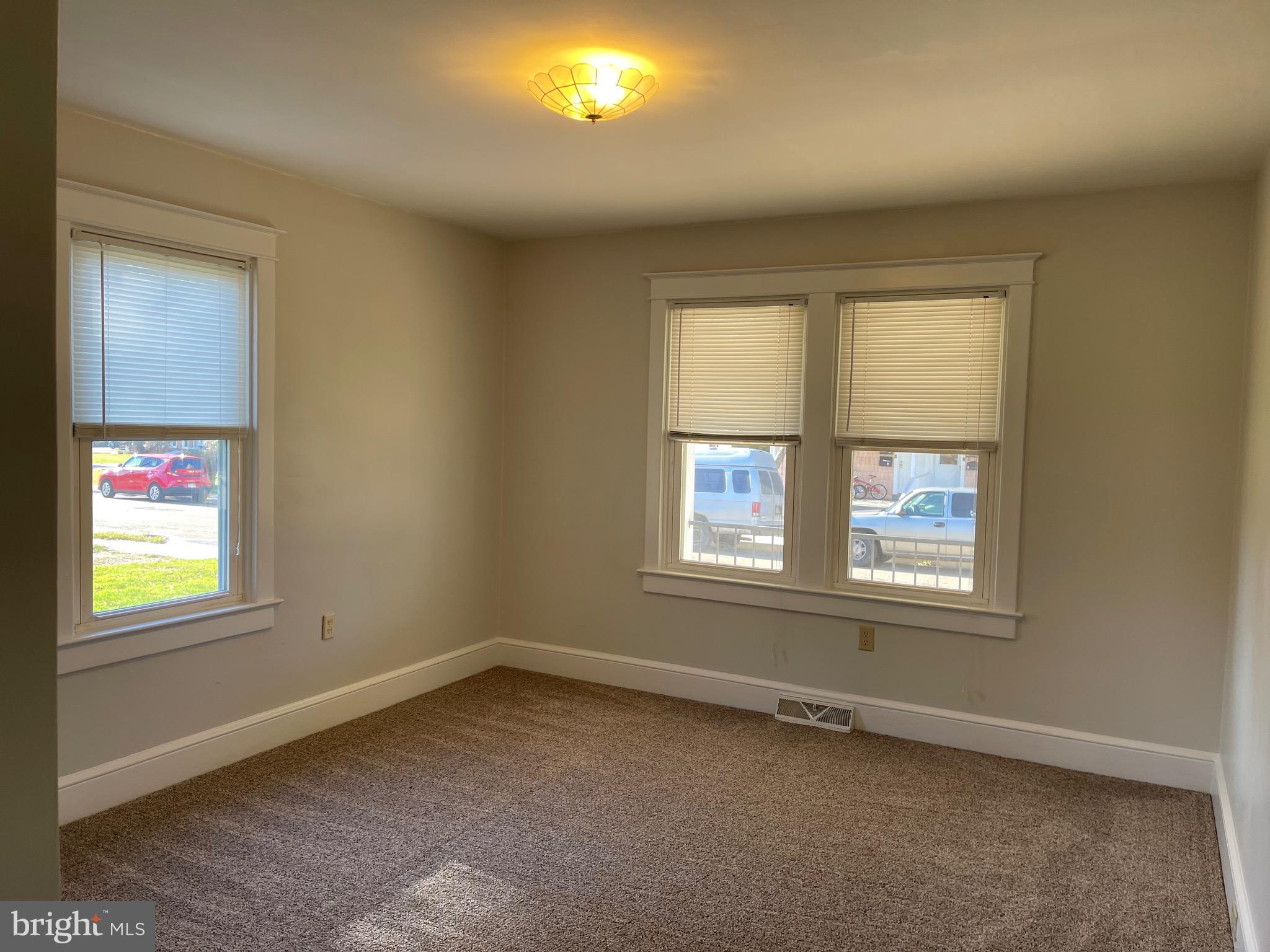 23 Addison Street Oxford, PA 19363 - Photo 3 of 15 an empty room with a window