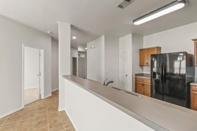 a large bathroom with a tub and a shower