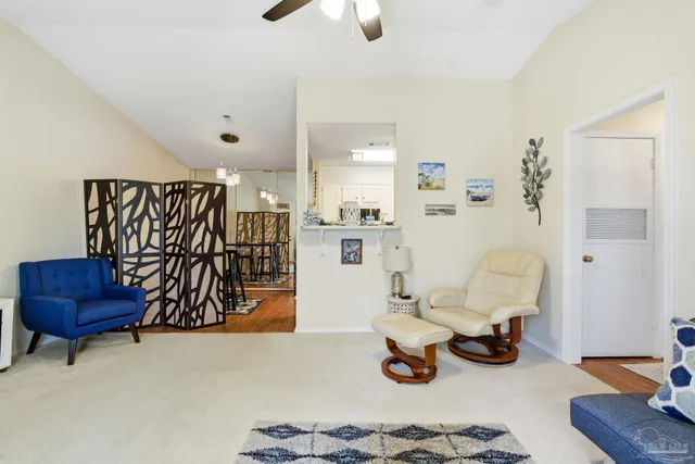 a view of livingroom with furniture and a couch