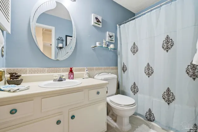 a front view of a house with a gate