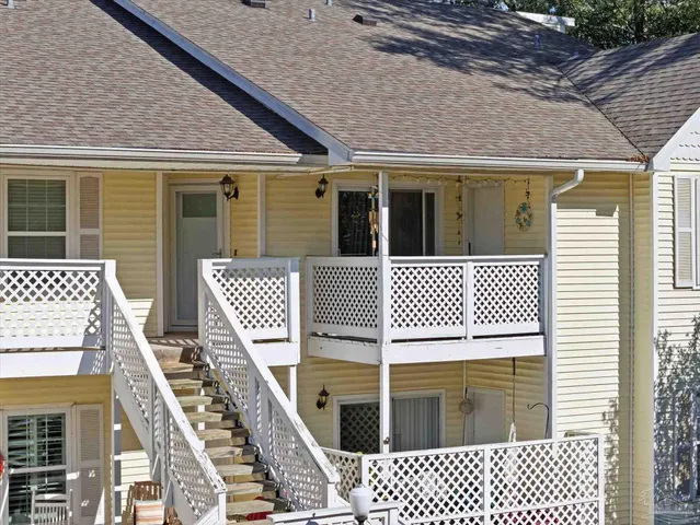 a view of a car park in front of house