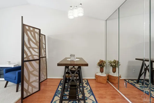 a room with furniture and wooden floor