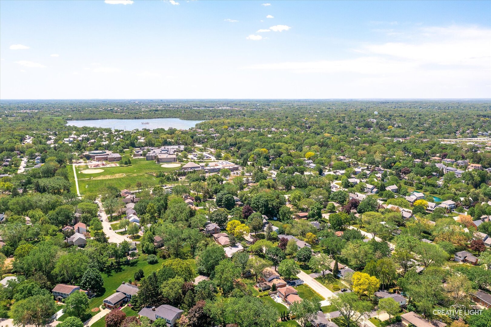 256 Beverly Road Barrington, IL 60010 - Photo 2 of 7 an aerial view of residential houses with outdoor space and trees