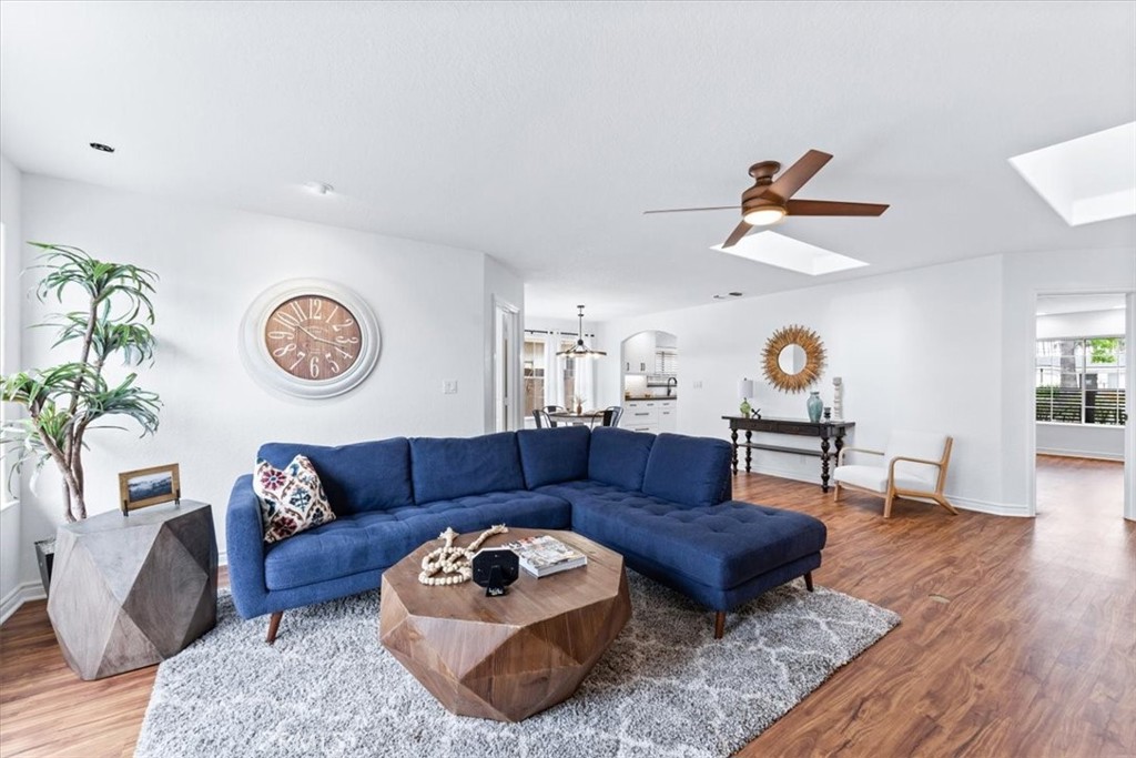 18322 Delaware Street Huntington Beach, CA 92648 - Photo 1 of 1 a living room with furniture a rug and a window