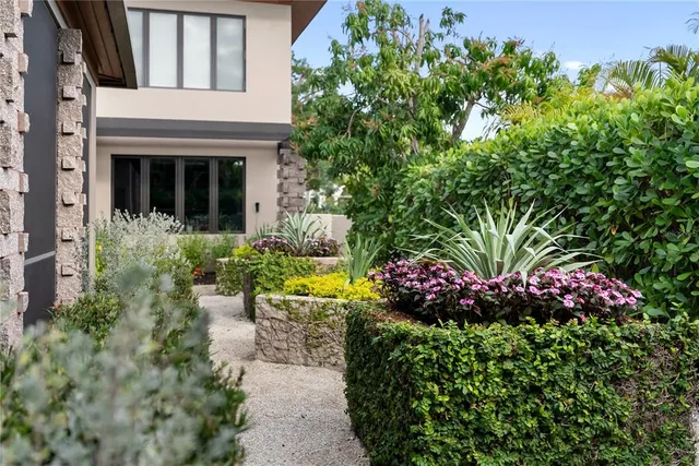 a kitchen with a stove and a white cabinets
