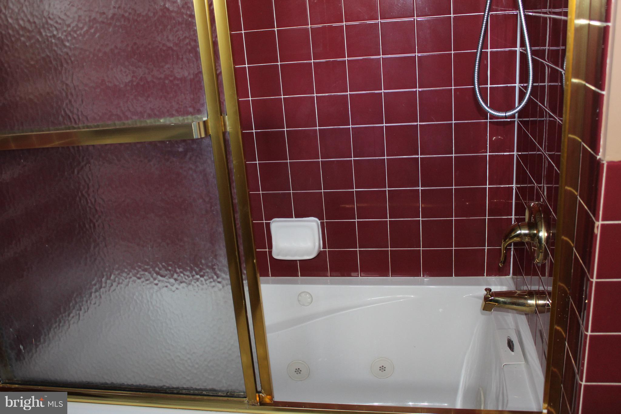 9206 Laramie Road Philadelphia, PA 19115 - Photo 14 of 19 a bathroom with a shower