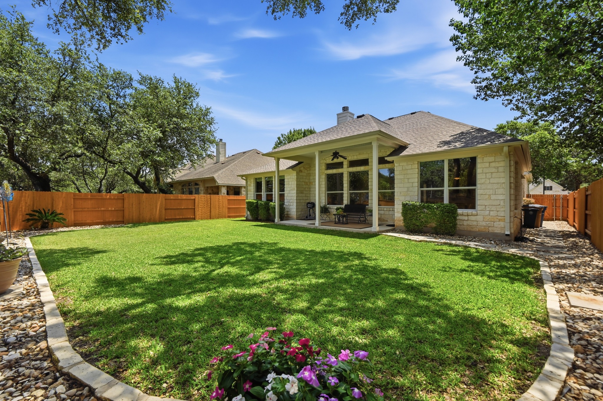 7301 Seneca Falls Loop Austin, TX 78739 - Photo 29 of 36 This is yard is beautifully maintained.