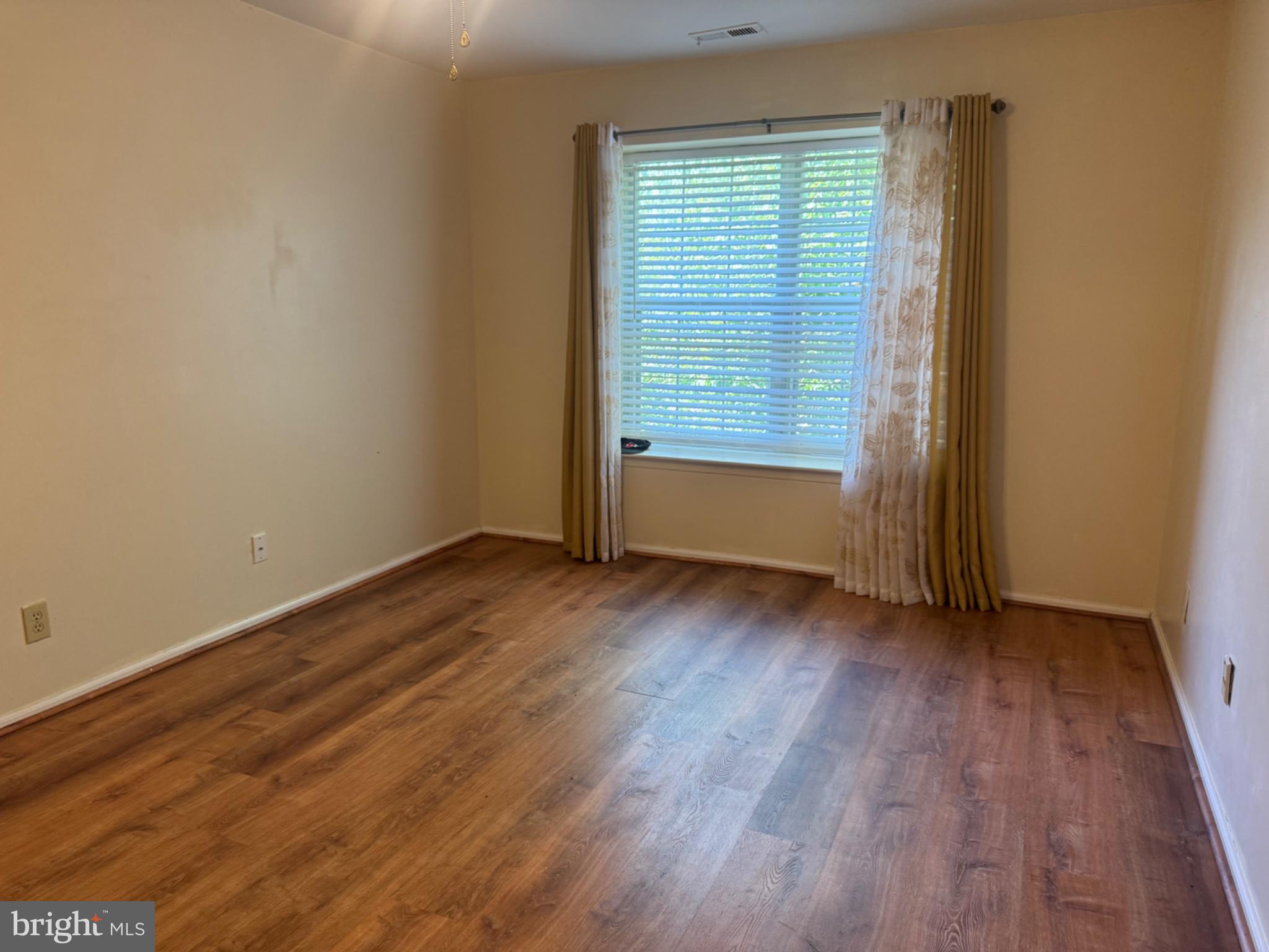 1908 B Ralston Drive Mount Laurel, NJ 08054 - Photo 17 of 21 an empty room with wooden floor and windows