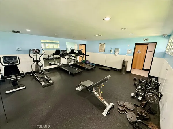 a view of a room with gym equipment