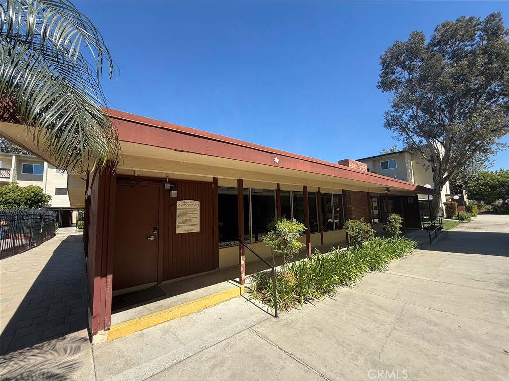 12200 Montecito Road, Unit D221 Seal Beach, CA 90740 - Photo 16 of 27 a view of a house with a yard
