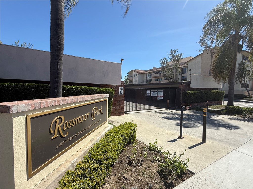 12200 Montecito Road, Unit D221 Seal Beach, CA 90740 - Photo 17 of 27 a view of a street with wooden fence