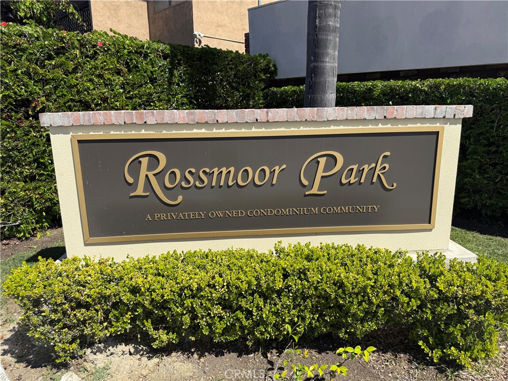 12200 Montecito Road, Unit D221 Seal Beach, CA 90740 - Photo 22 of 27 a sign broad in front of flowers