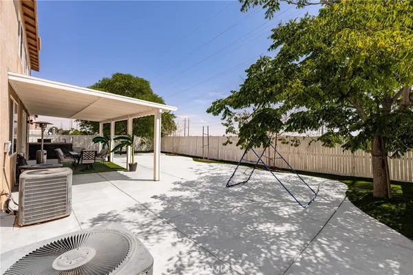 a view of a backyard of the house