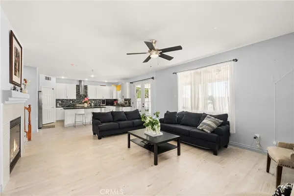 a living room with furniture and a window