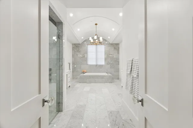 en empty room with windows and outdoor view