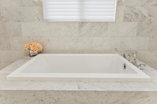 a bathroom with a bathtub