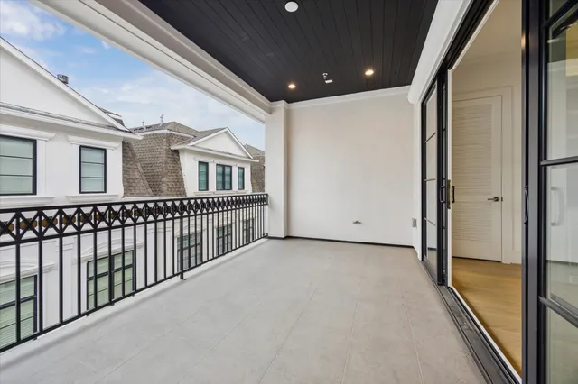 a view of a porch with wooden floor