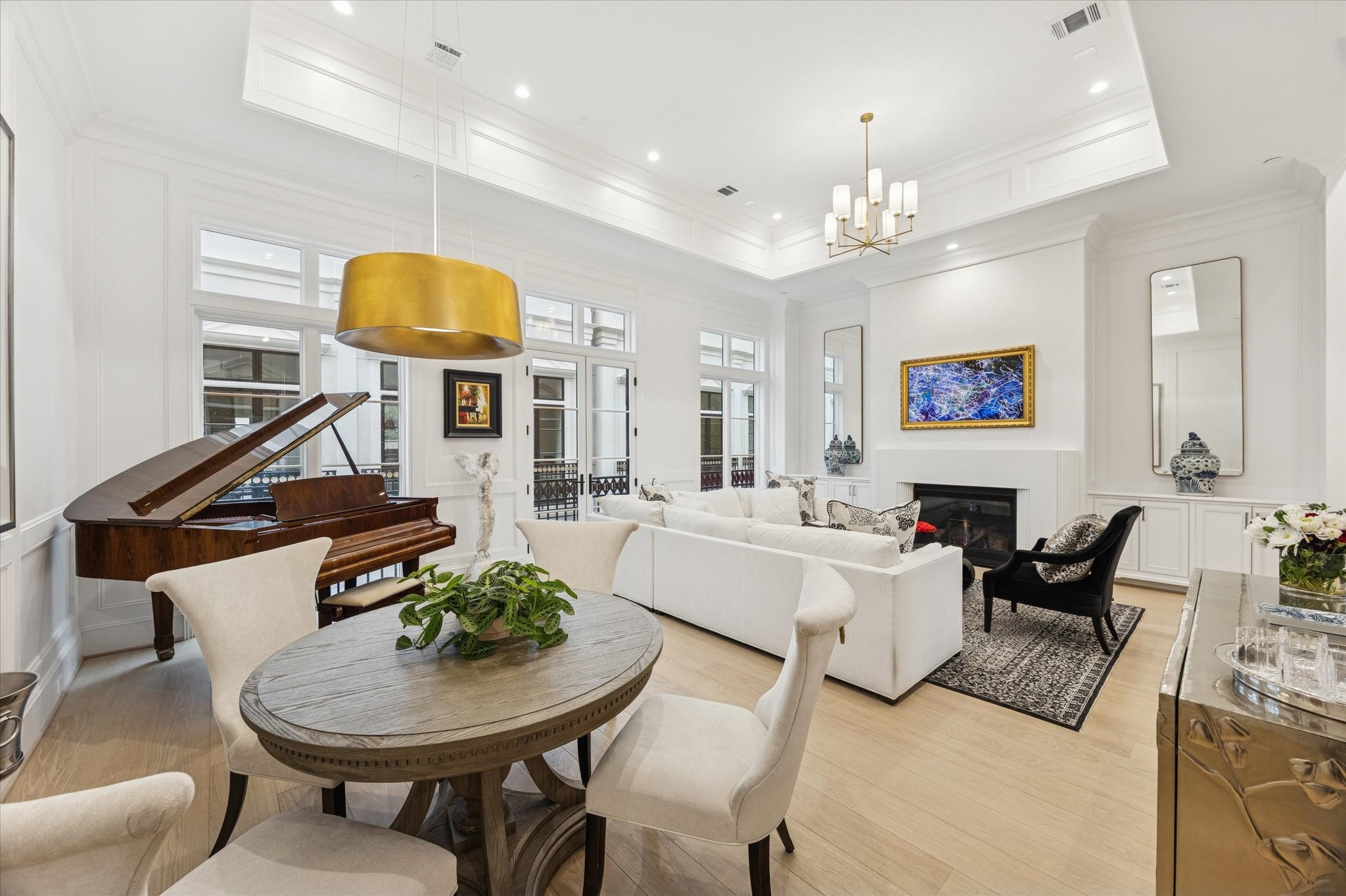 1335 Peden Street Houston, TX 77019 - Photo 10 of 37 a view of a dining room with furniture and a chandelier