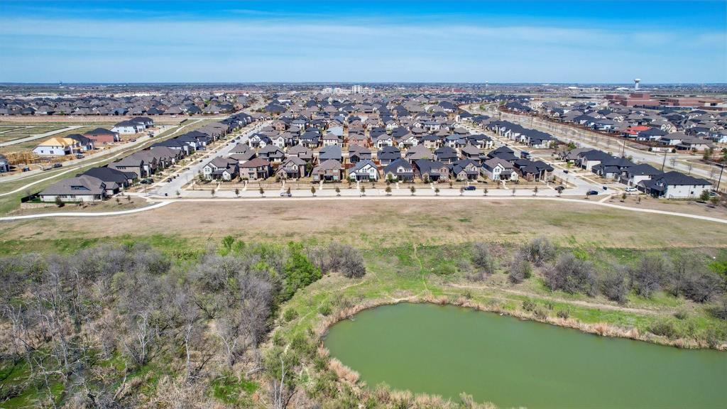 2172 Poppyvine Road Frisco, TX 75033 - Photo 3 of 40 View of property location with nearby suburban area and a nearby body of water