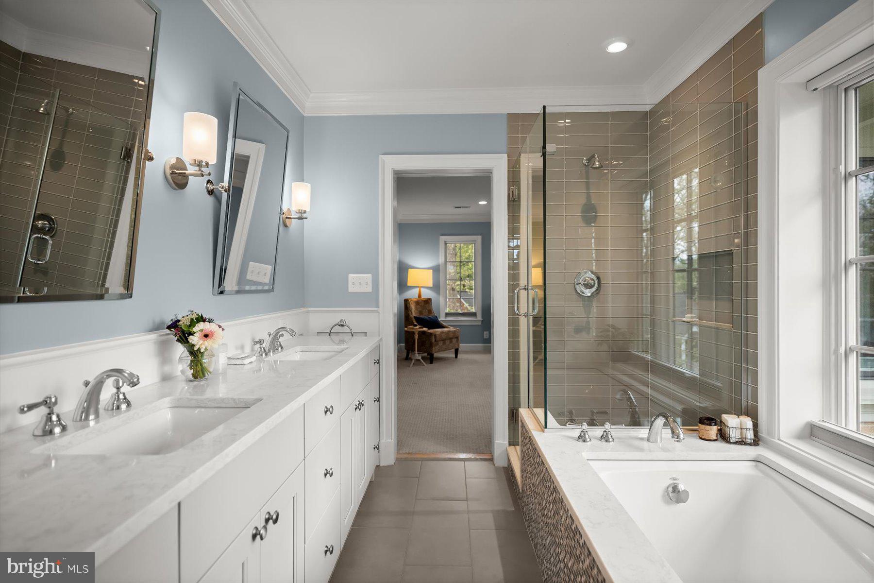 5532 14th Road North Arlington, VA 22205 - Photo 33 of 65 a en suite spacious bathroom with double vanity shower and a mirror