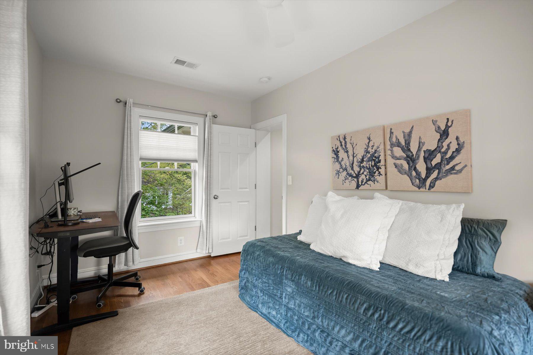 5532 14th Road North Arlington, VA 22205 - Photo 35 of 65 a spacious bedroom with a bed and a window
