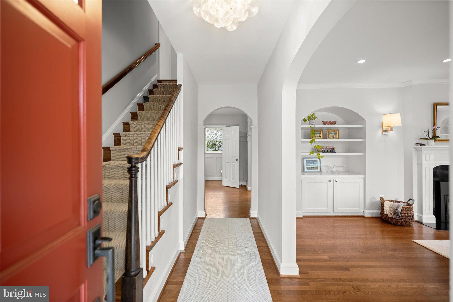 5532 14th Road North Arlington, VA 22205 - Photo 4 of 65 a view of a hallway view with wooden floor and staircase