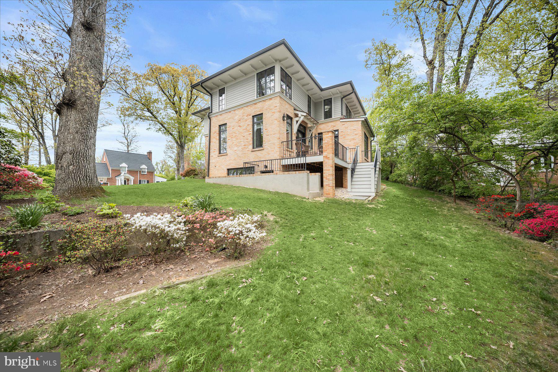 5532 14th Road North Arlington, VA 22205 - Photo 50 of 65 a view of a big house with a big yard and large trees