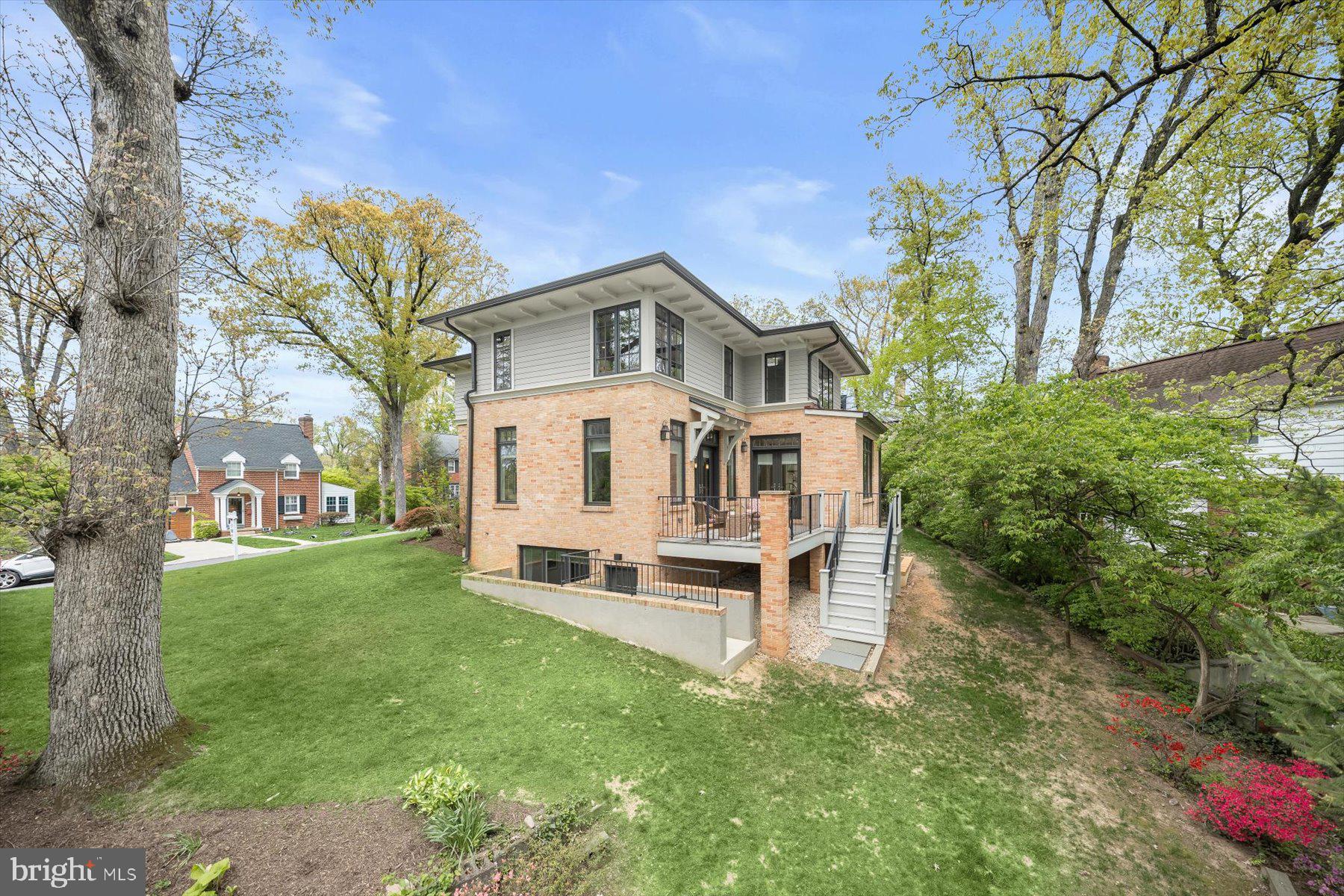5532 14th Road North Arlington, VA 22205 - Photo 52 of 65 a view of a house with a big yard plants and large trees