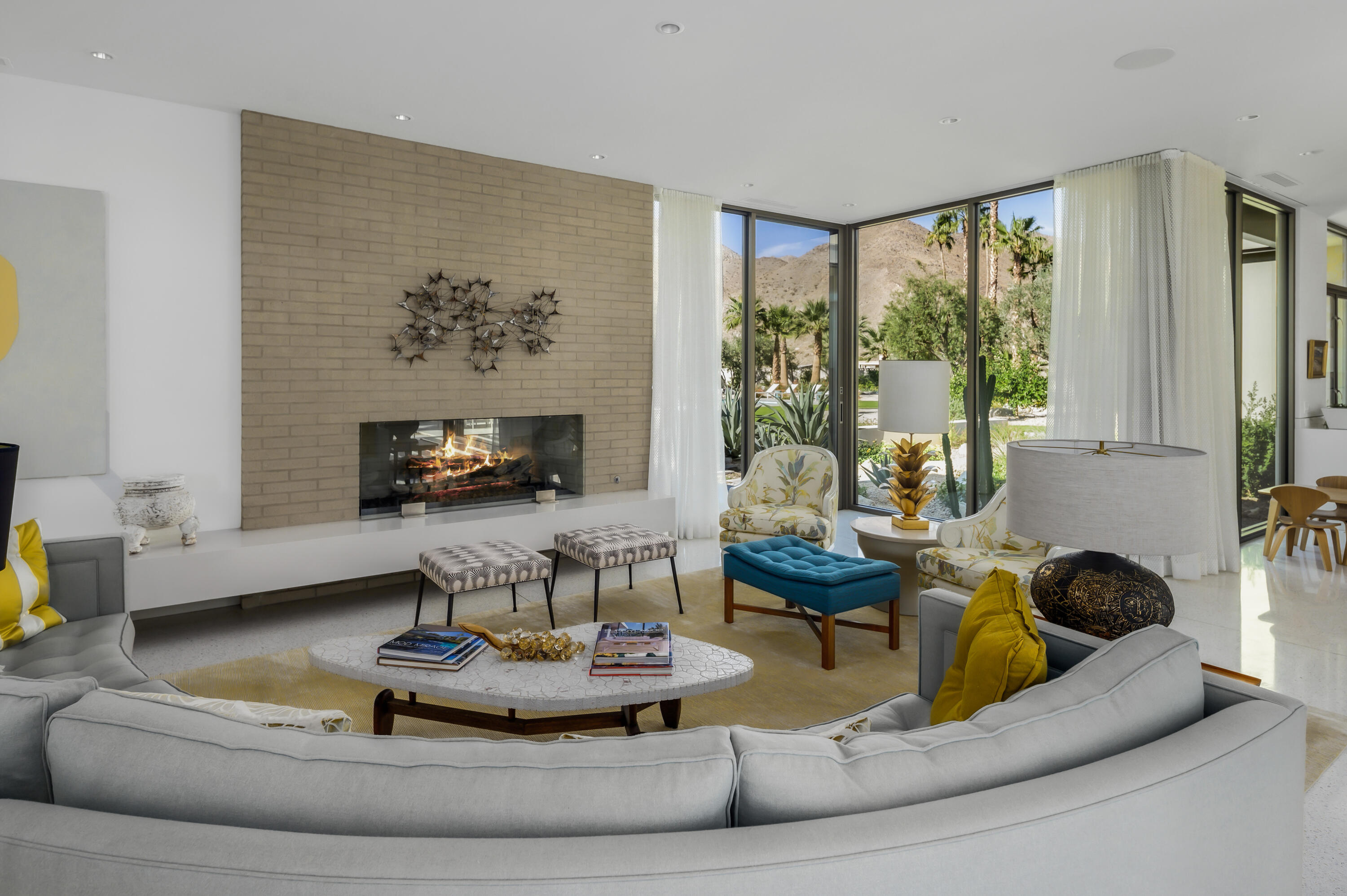 70155 Carson Road Rancho Mirage, CA 92270 - Photo 13 of 56 a living room with furniture and a flat screen tv