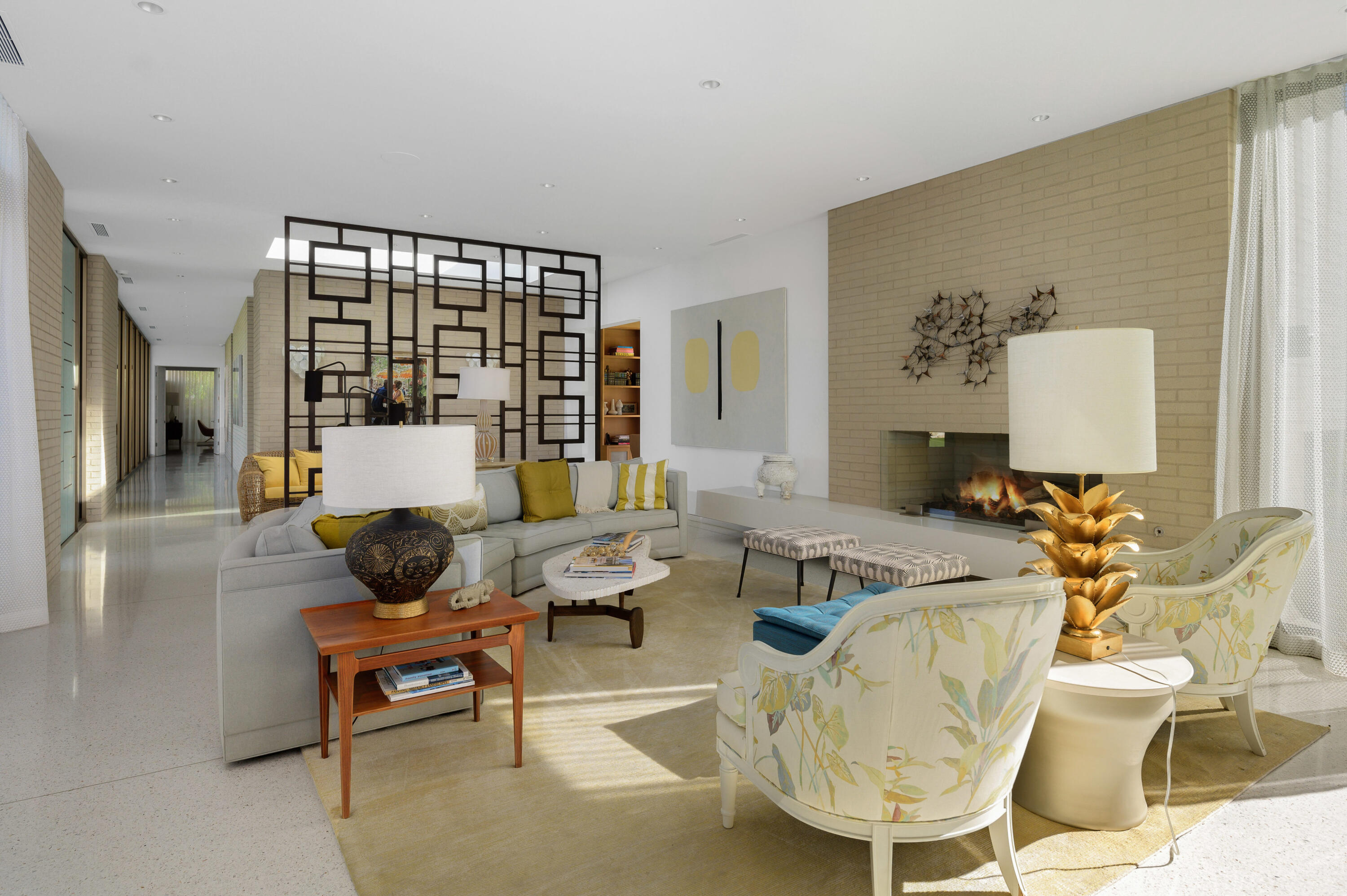 70155 Carson Road Rancho Mirage, CA 92270 - Photo 14 of 56 a living room with furniture and a large window