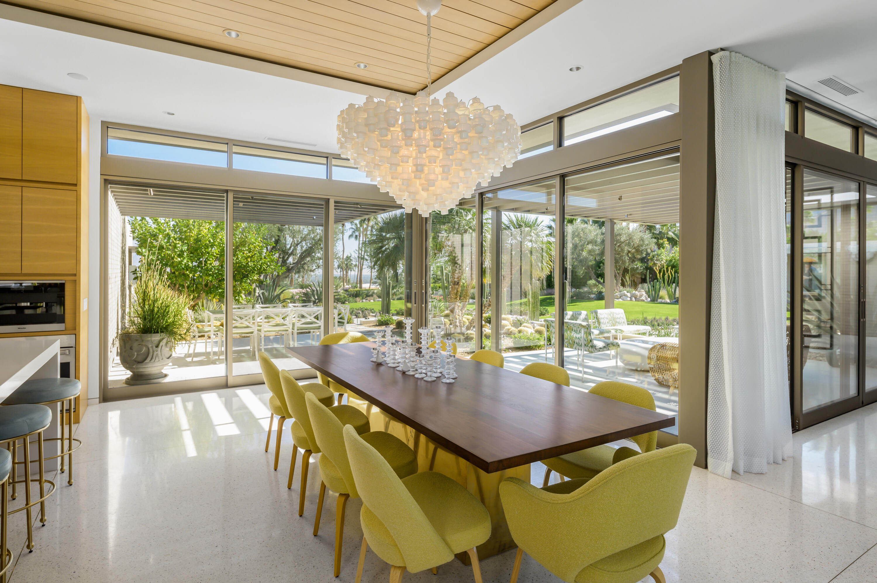 70155 Carson Road Rancho Mirage, CA 92270 - Photo 18 of 56 a view of a dining room with furniture window and outside view
