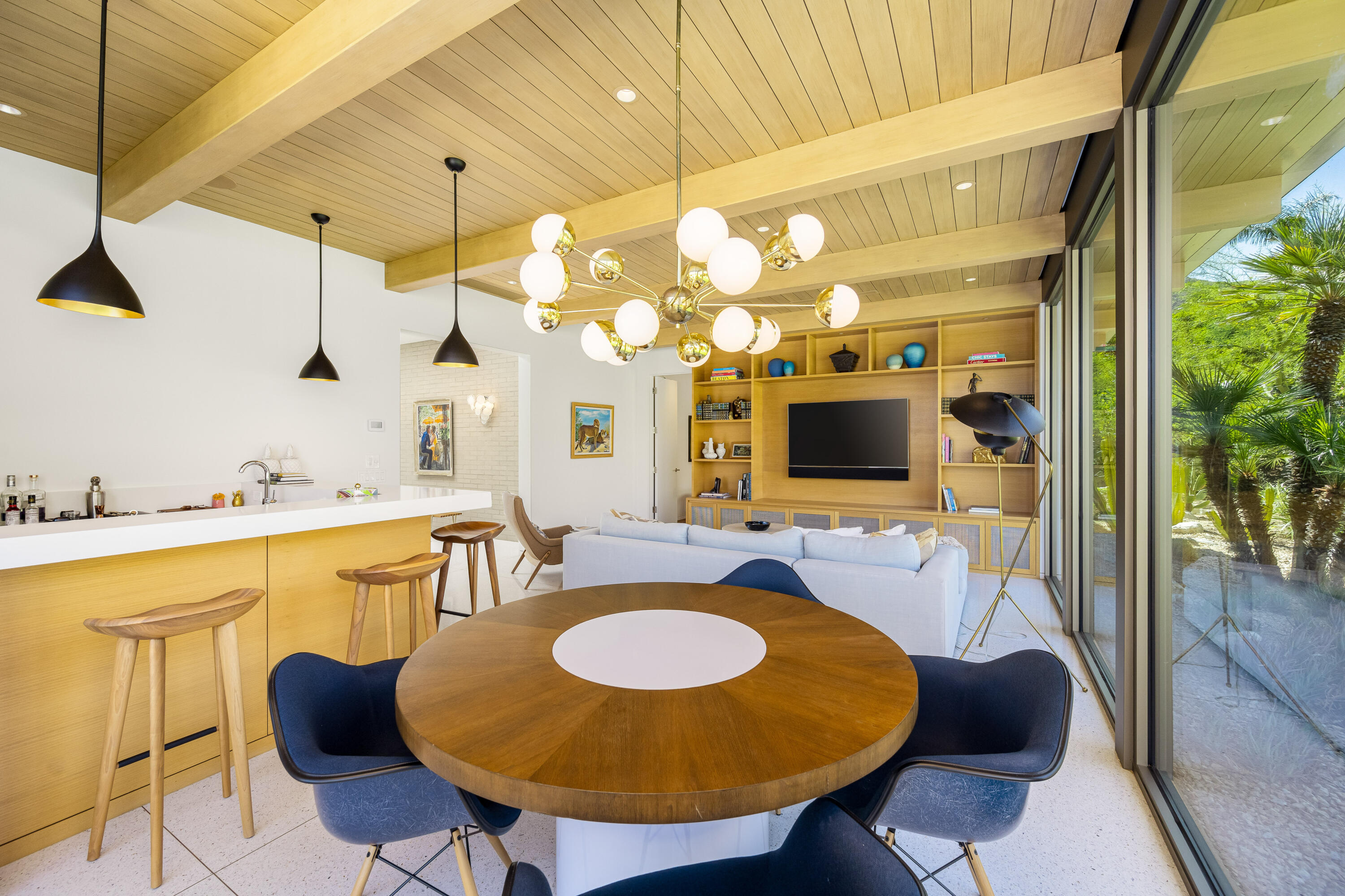 70155 Carson Road Rancho Mirage, CA 92270 - Photo 29 of 56 a view of a dining room with furniture and a chandelier