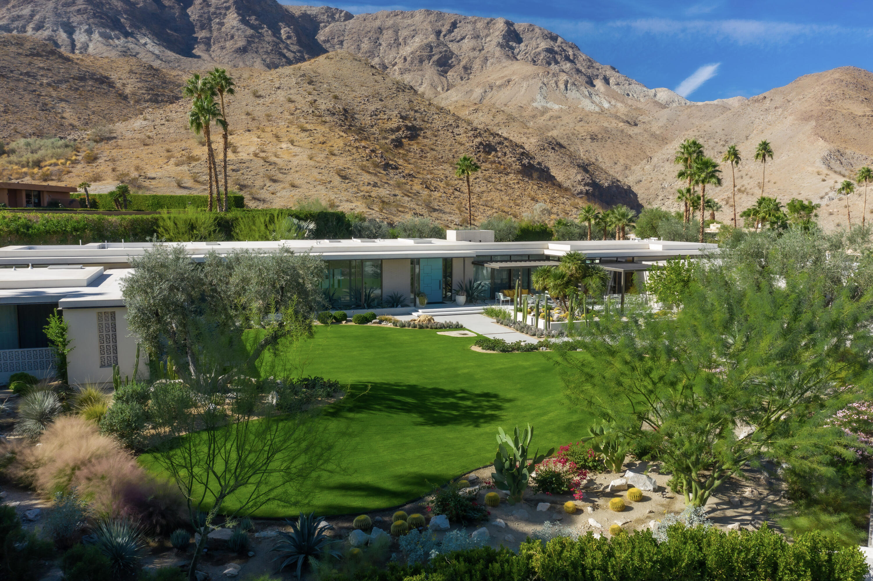 70155 Carson Road Rancho Mirage, CA 92270 - Photo 3 of 56 a view of a lake with a mountain in the background