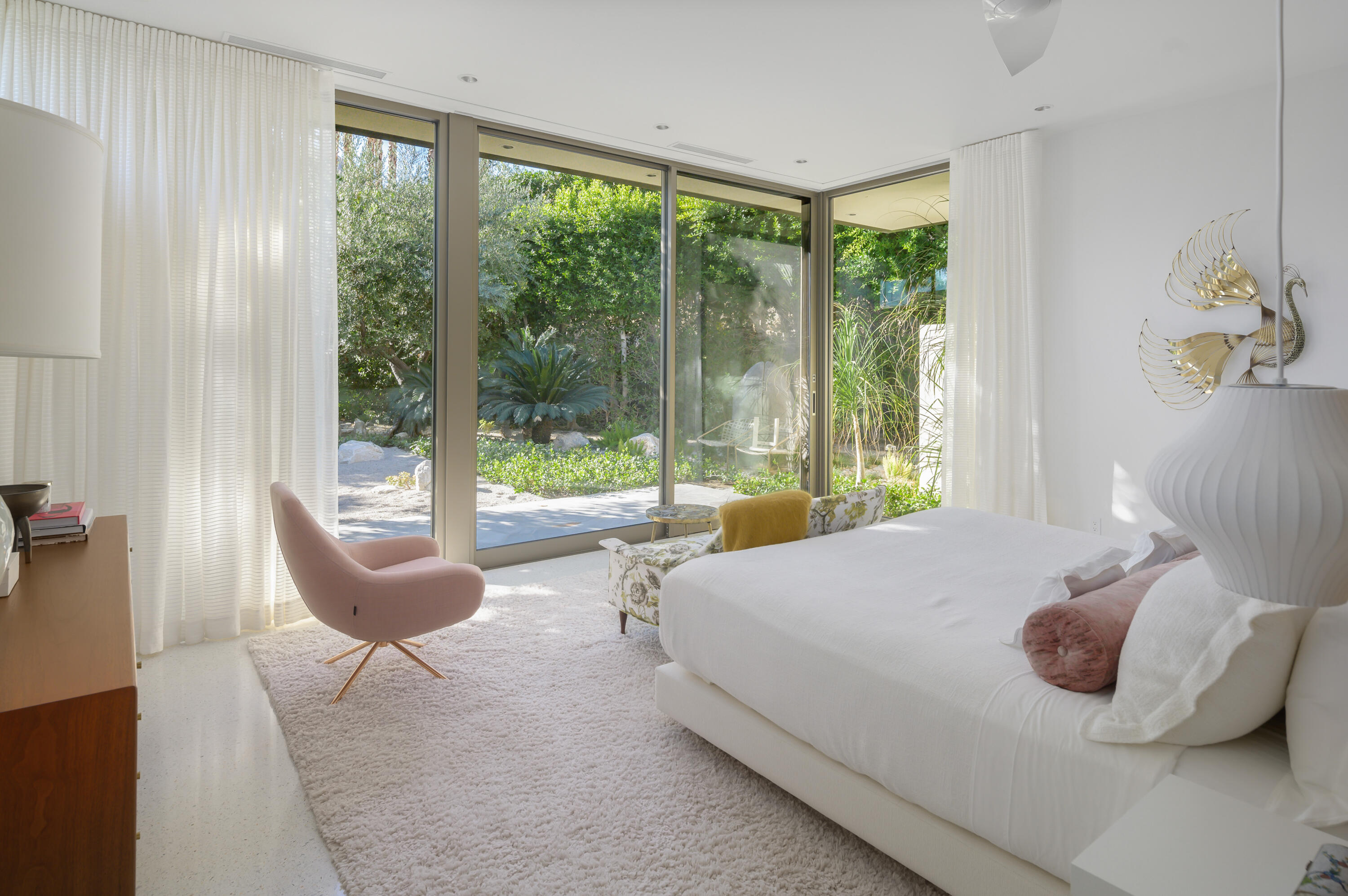 70155 Carson Road Rancho Mirage, CA 92270 - Photo 36 of 56 a bedroom with a bed and a large window