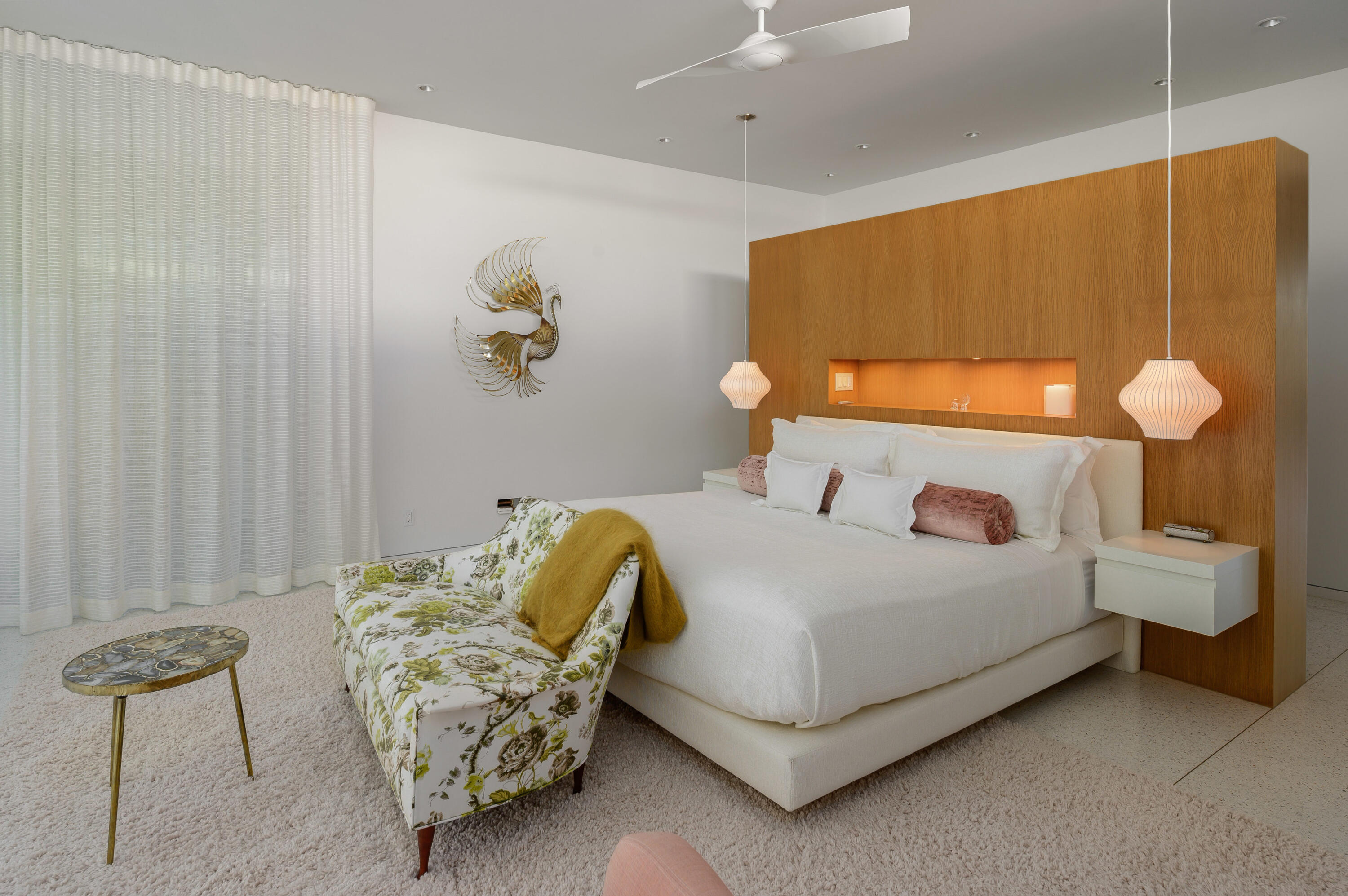 70155 Carson Road Rancho Mirage, CA 92270 - Photo 39 of 56 a bedroom with a bed and a chandelier