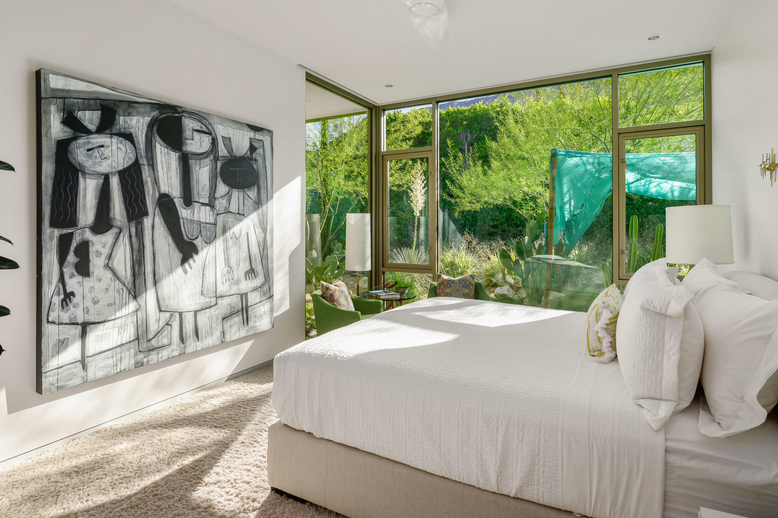 70155 Carson Road Rancho Mirage, CA 92270 - Photo 42 of 56 a bedroom with a bed and a large window with outer view