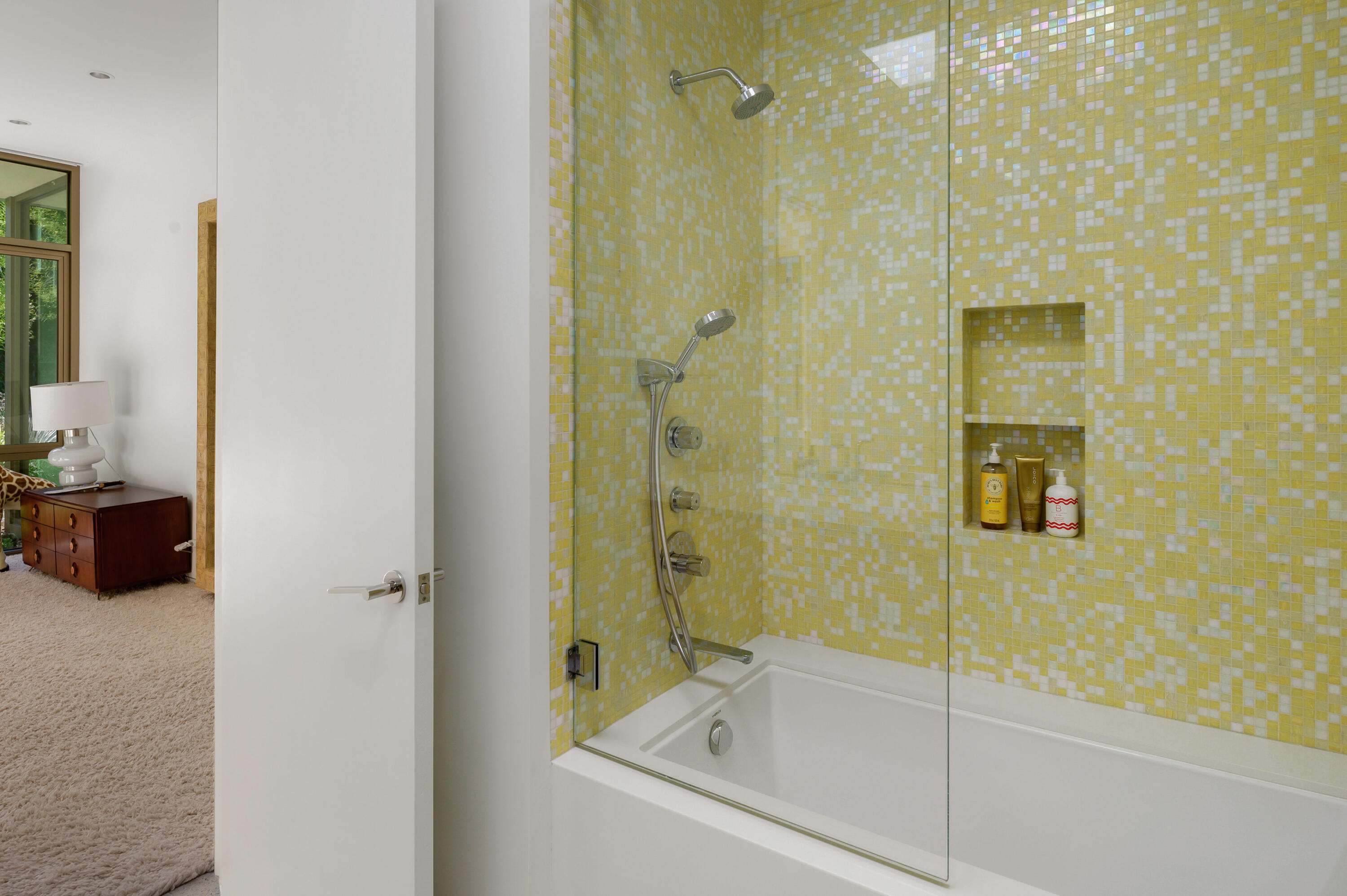 70155 Carson Road Rancho Mirage, CA 92270 - Photo 45 of 56 a bathroom with a glass shower door