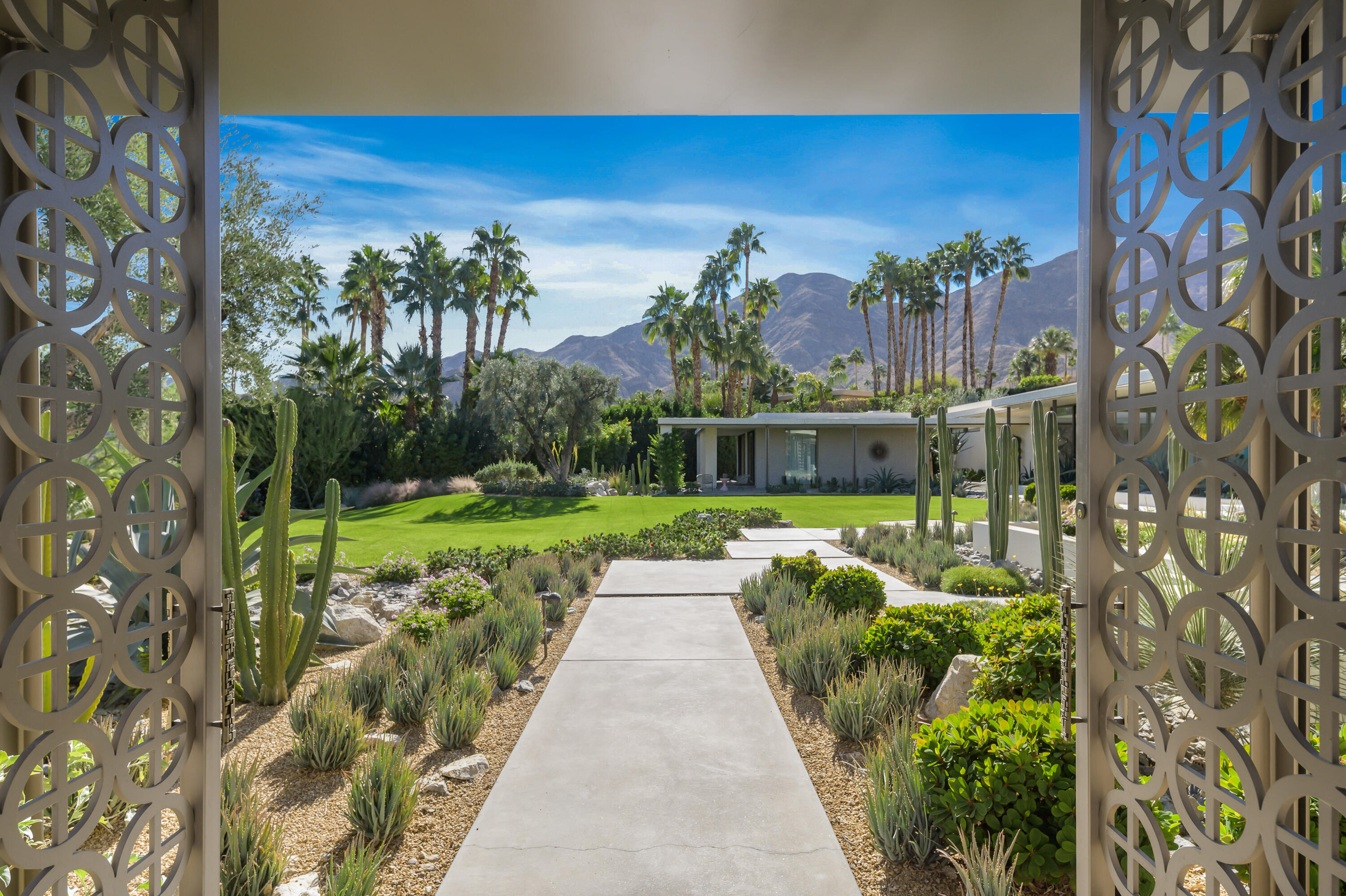70155 Carson Road Rancho Mirage, CA 92270 - Photo 5 of 56 a view of a garden with plants