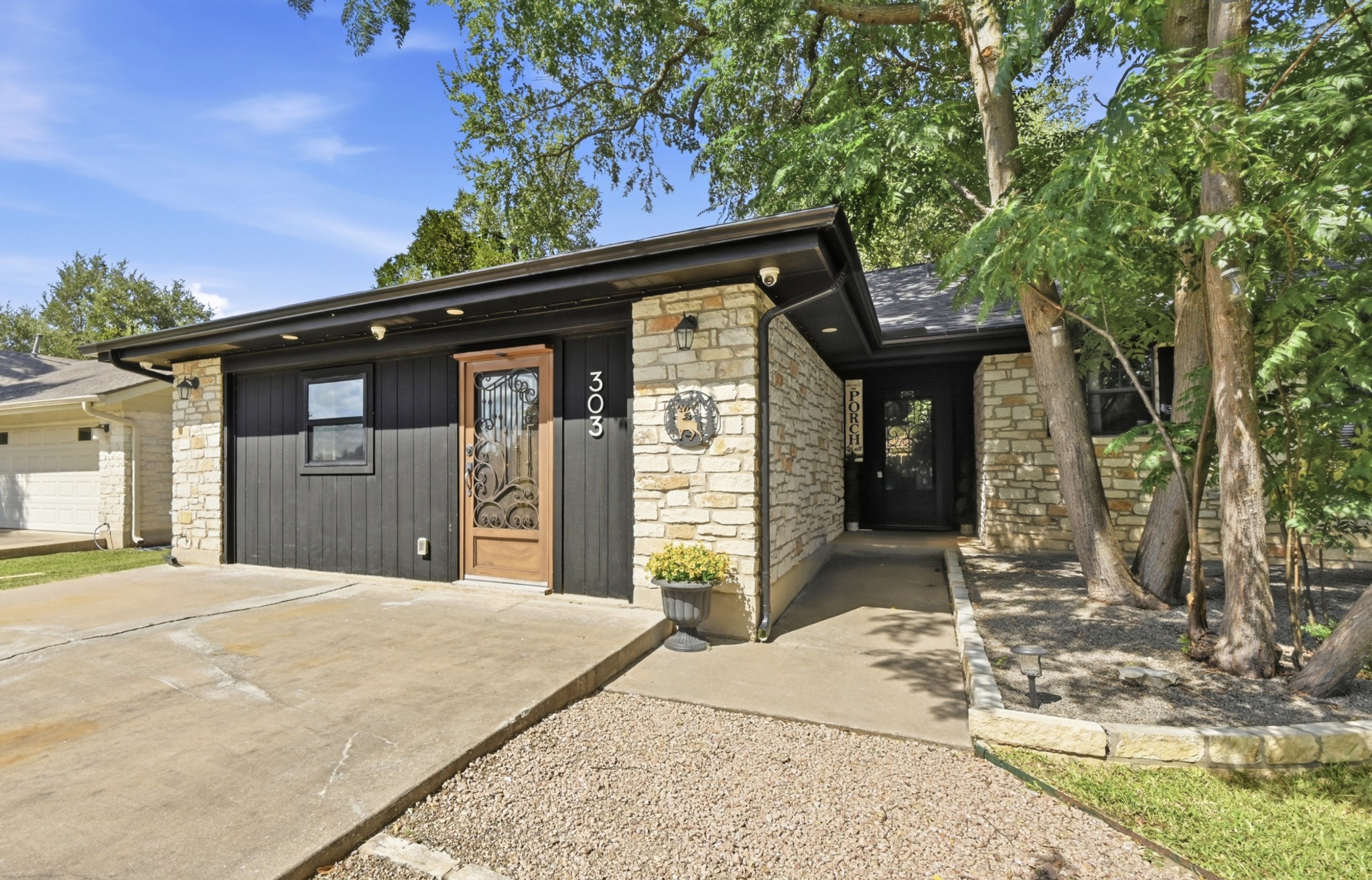 303 Pin Oak Drive Georgetown, TX 78628 - Photo 5 of 36 a front view of a house with a porch