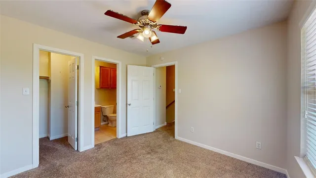 a bathroom with a tub and shower