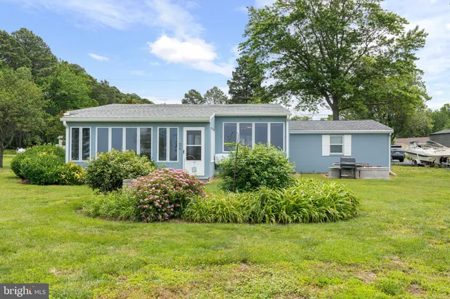 a house view with a garden space