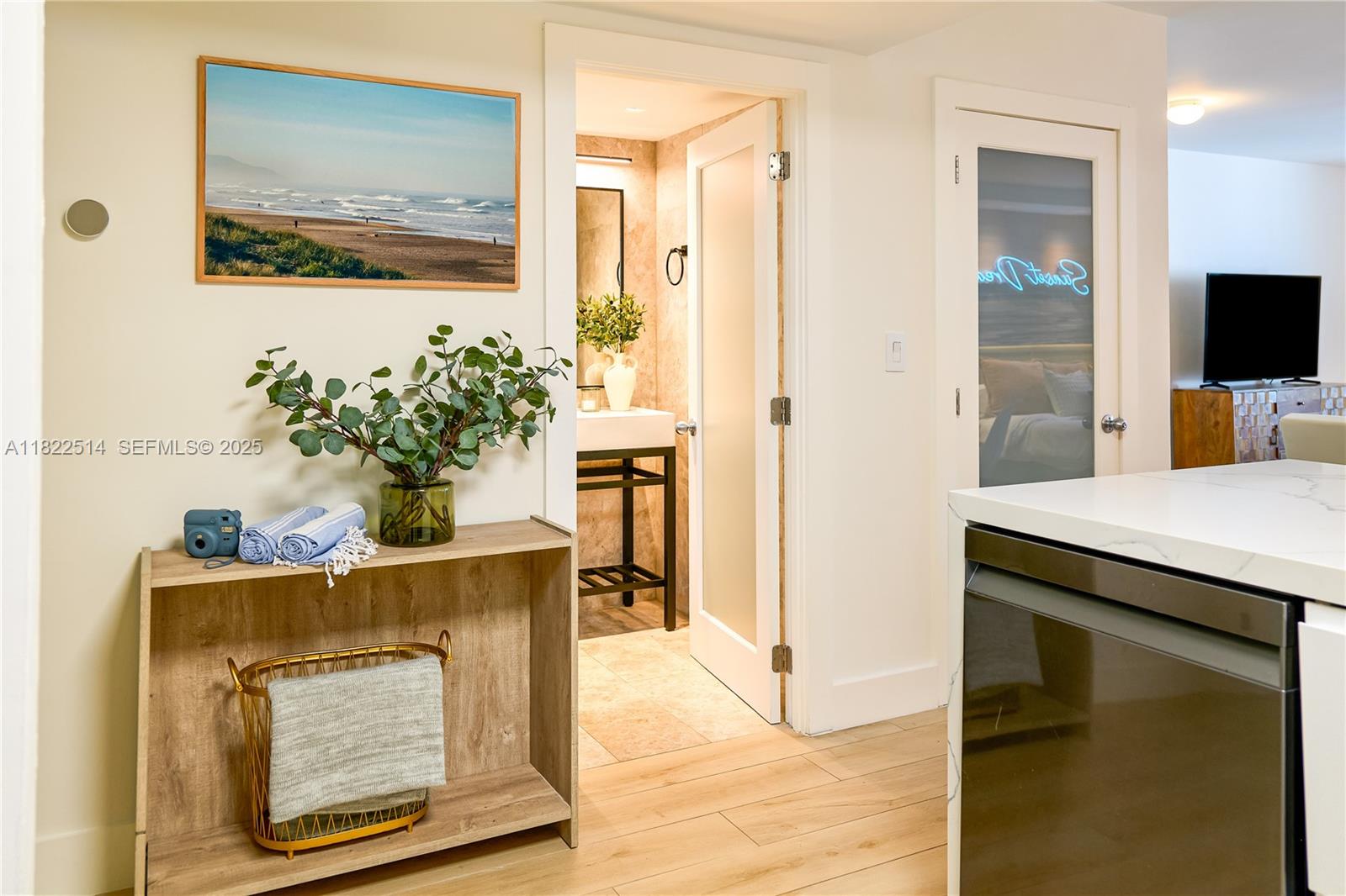 2301 Collins Avenue, Unit 329 Miami Beach, FL 33139 - Photo 14 of 47 a living room with furniture and flowers