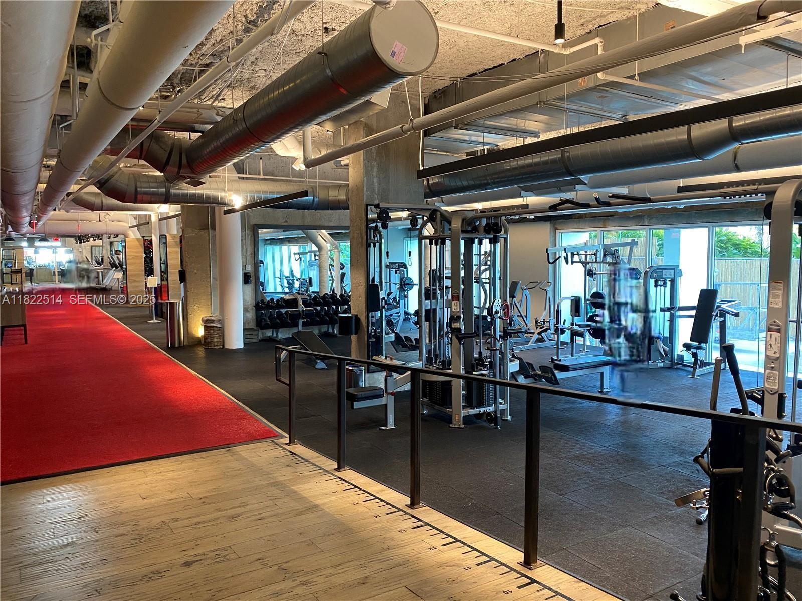 2301 Collins Avenue, Unit 329 Miami Beach, FL 33139 - Photo 42 of 47 a view of a room with gym equipment