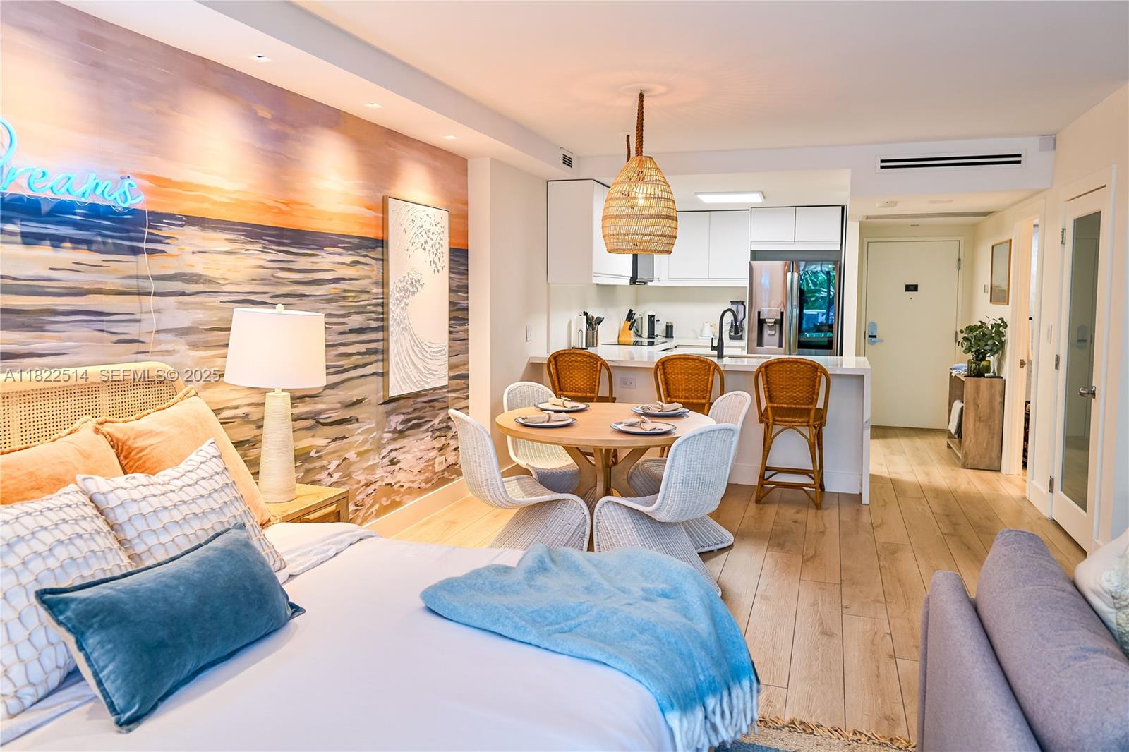 2301 Collins Avenue, Unit 329 Miami Beach, FL 33139 - Photo 5 of 47 a living room with furniture and a large window