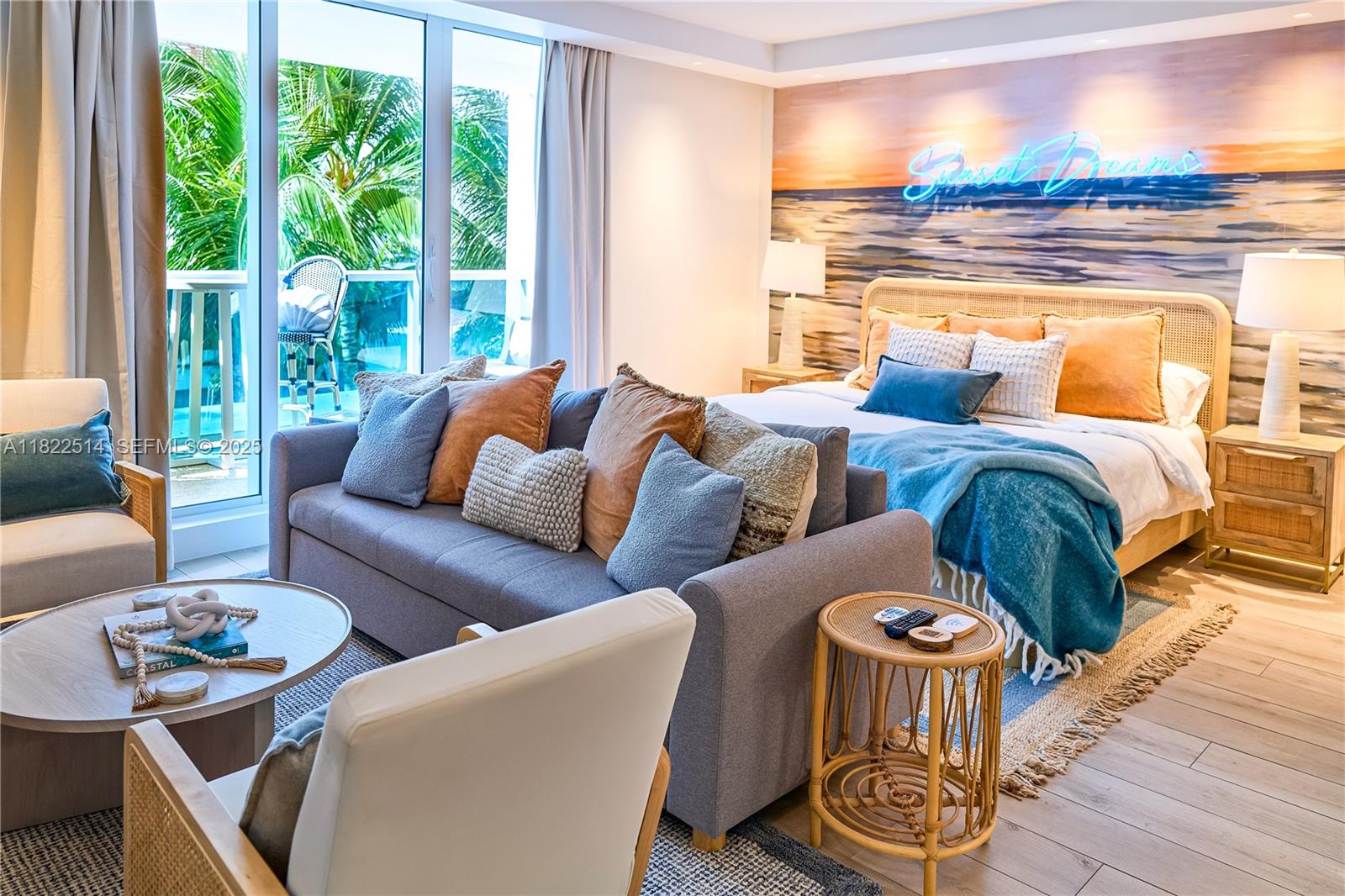 2301 Collins Avenue, Unit 329 Miami Beach, FL 33139 - Photo 7 of 47 a living room with furniture and a large window